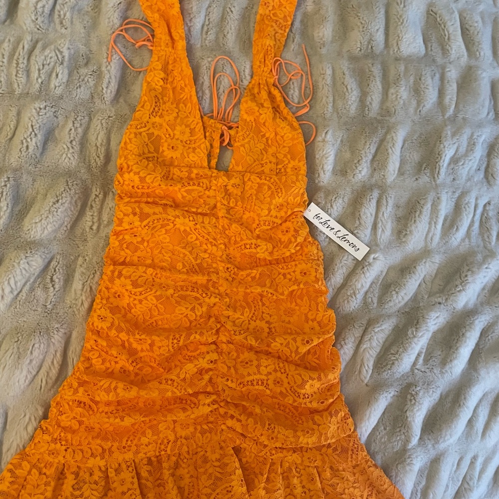 Brand new never worn For Love and Lemons dress. No rips or tears! Great for hoco